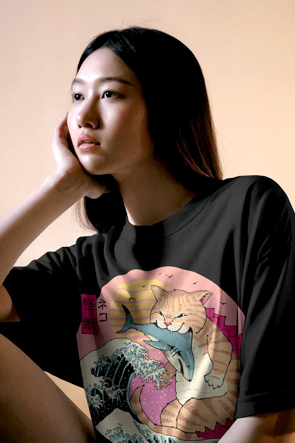 Limited edition Kaiju Neko Wave T-shirt combining retro wave art and giant cat monster theme, premium cotton, Mizuchi Clothing.