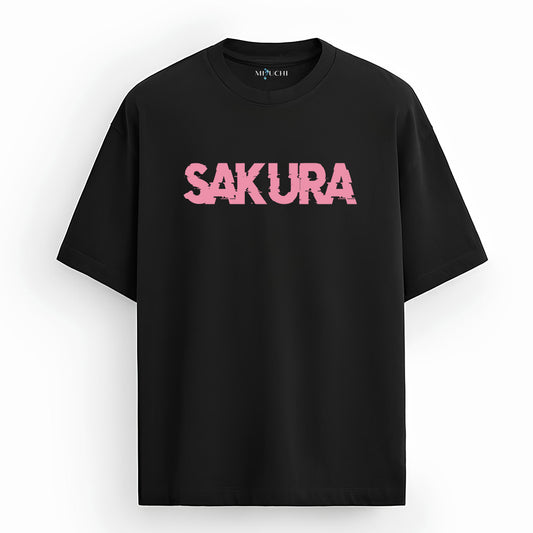 Mizuchi Sakura Tee front: Oversized pink 'SAKURA' graffiti text on premium black 100% cotton t-shirt, Monochrome Series streetwear.